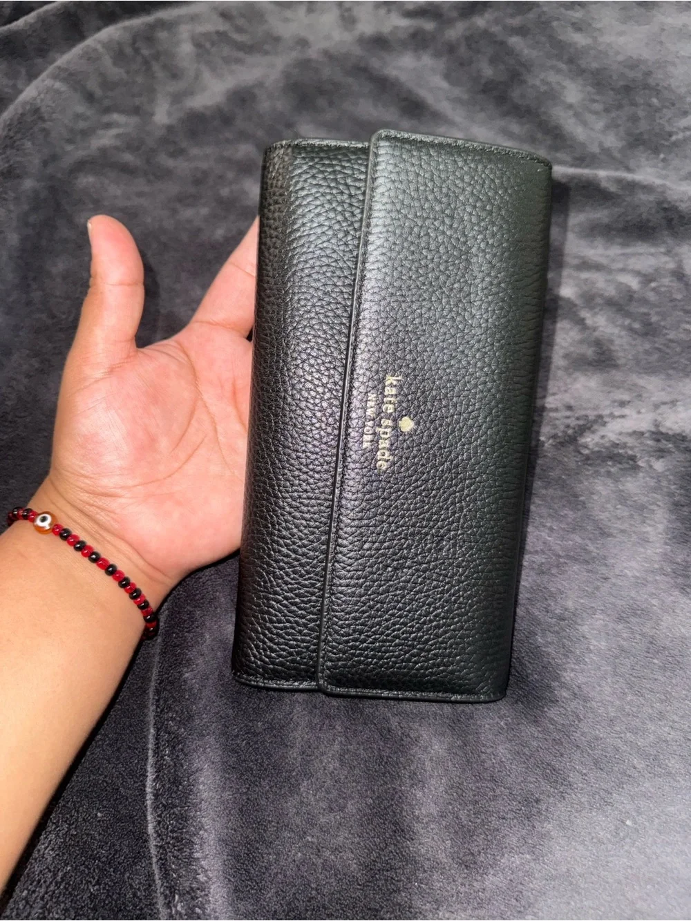 kate spade black pebbled leather continental clutch wallet with gold logo